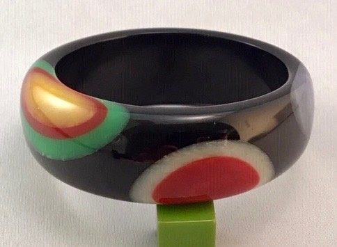 SZ17 Shultz black bakelite bangle with edge half dots in multicolors